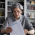 Person reviewing Ticket to Work documents